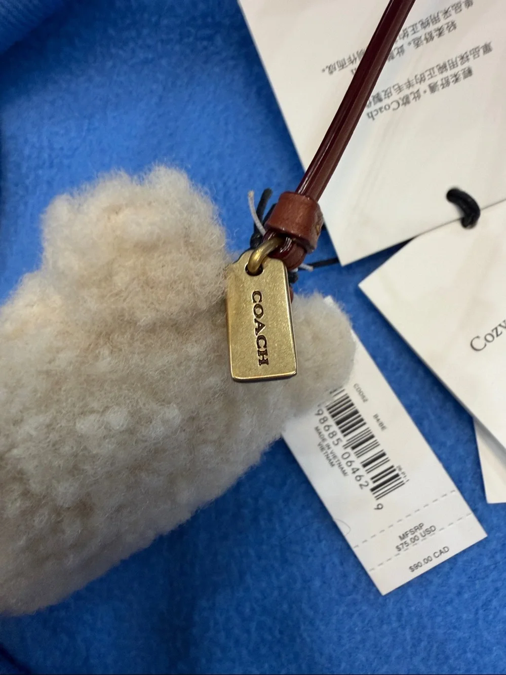 COACH Cream Shearling Bear Bag Charm with Brown Leather Strap